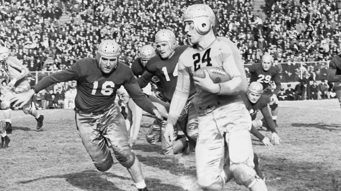 All American halfback, Byron “Whizzer” White (24) evades the entire Rice team, and goes all the way for a touchdown in Dallas, Texas, on Jan. 1, 1937. White later became an Associate Justice of the U.S. Supreme Court.