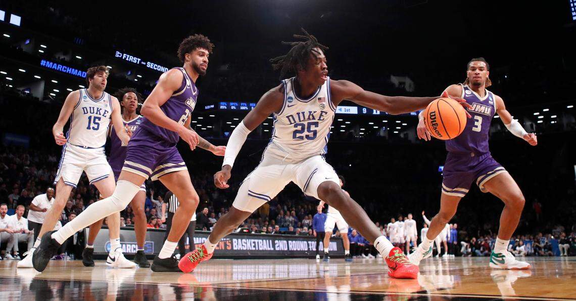 Duke’s Mark Mitchell (25) pulls in a loose ball during Duke’s 93-55 victory over James Madison in the second round of the NCAA Tournament at the Barclays Center in Brooklyn, N.Y., Sunday, March 24, 2024.