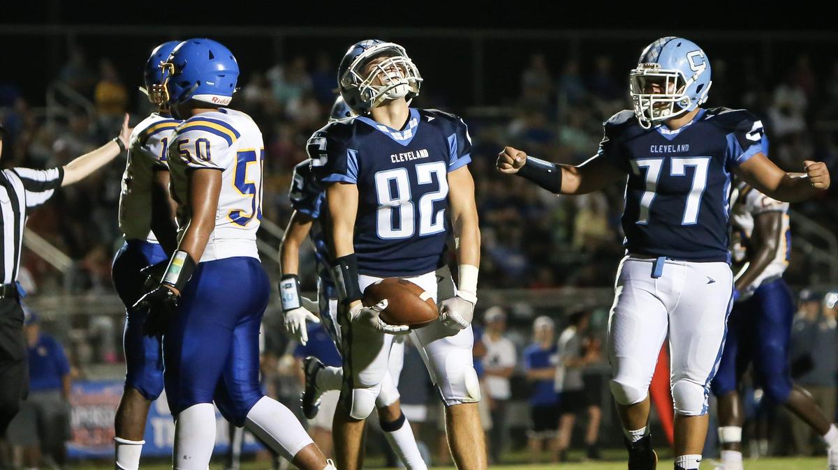 Cleveland receiver Carter Griffith (82) celebrates after catching a long pass at the goal line late in the first half during the Garner Trojans’ football game at the Cleveland Rams on Friday, August 30, 2019. Cleveland will host Southeast Raleigh on Wednesday.