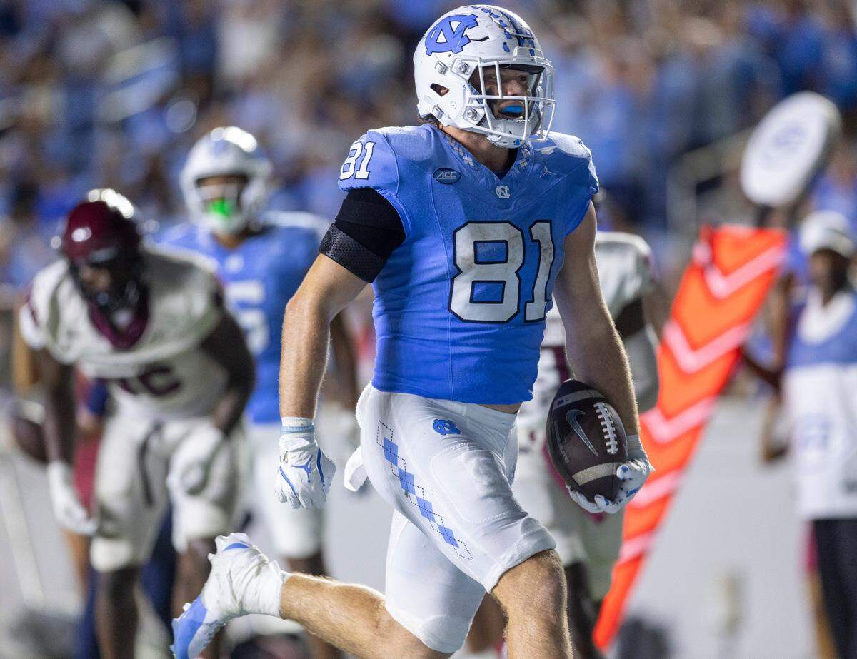 North Carolina tight end John Copenhaver (81) scores a touchdown on a 23-yard pass reception from quarterback Jacolby Criswell in the fourth quarter against N.C. Central on Saturday, September 14, 2024 at Kenan Stadium in Chapel Hill, N.C.
