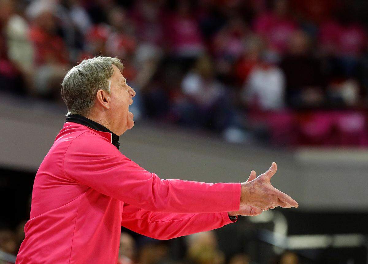 N.C. State head coach Wes Moore speaks with his team during the second half of the Wolfpack’s 77-67 win over Louisville on Monday, Feb. 5, 2024, at Reynolds Coliseum in Raleigh, N.C.