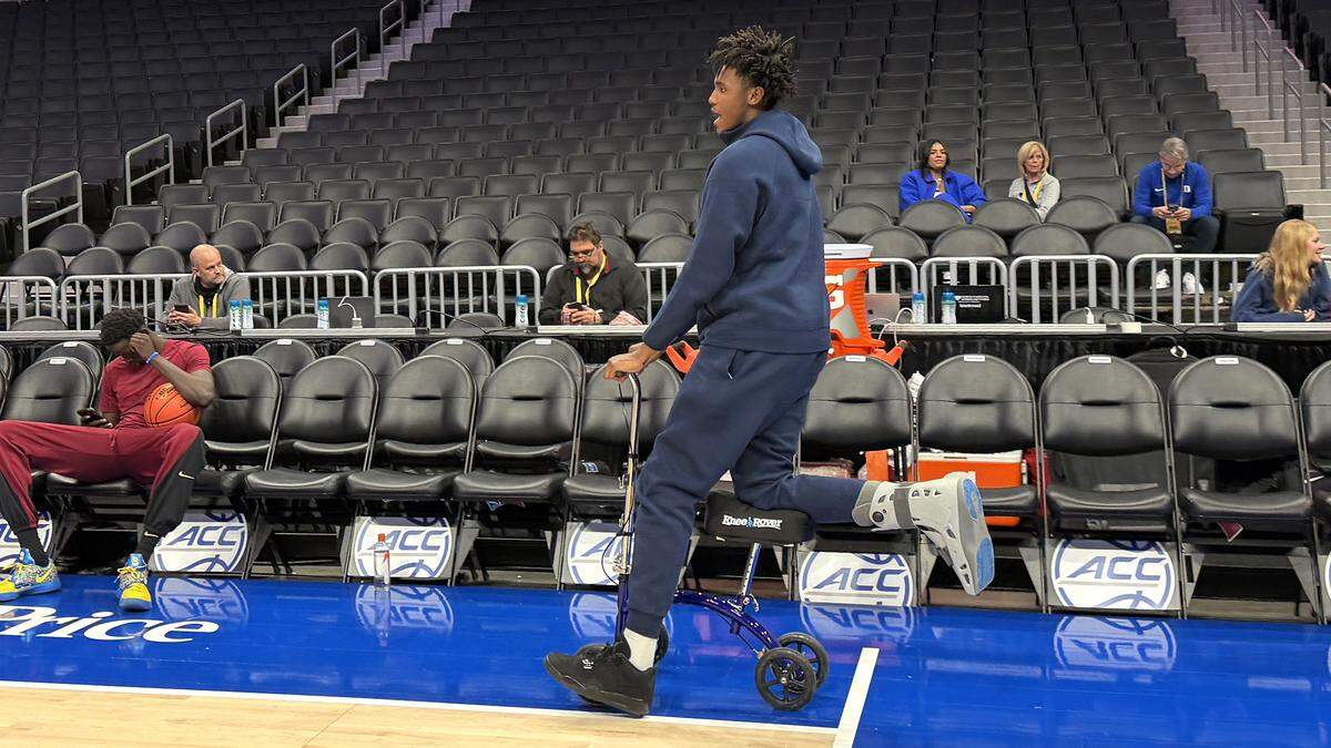 Duke’s Patrick Ngongba wheels out to the seats before Duke’s game against Florida State in the quarterfinals of the 2026 ACC Men’s Basketball Tournament at the Spectrum Center in Charlotte, North Carolina, on Thursday, March 12, 2026.