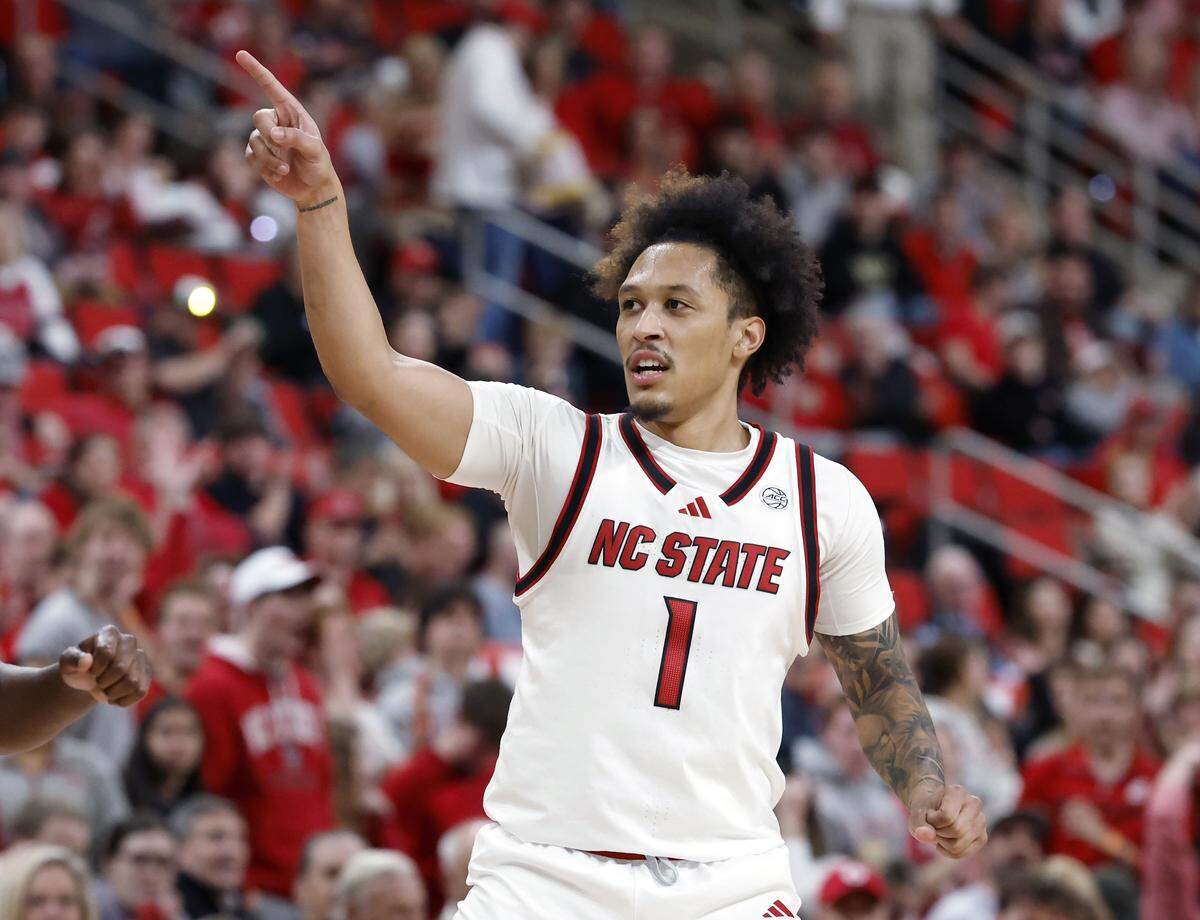 N.C. State’s Darrion Williams reacts after knocking down a shot during the second half of the Wolfpack’s 70-57 win over Wake Forest on Wednesday, Dec. 31, 2025, at Lenovo Center in Raleigh, N.C.