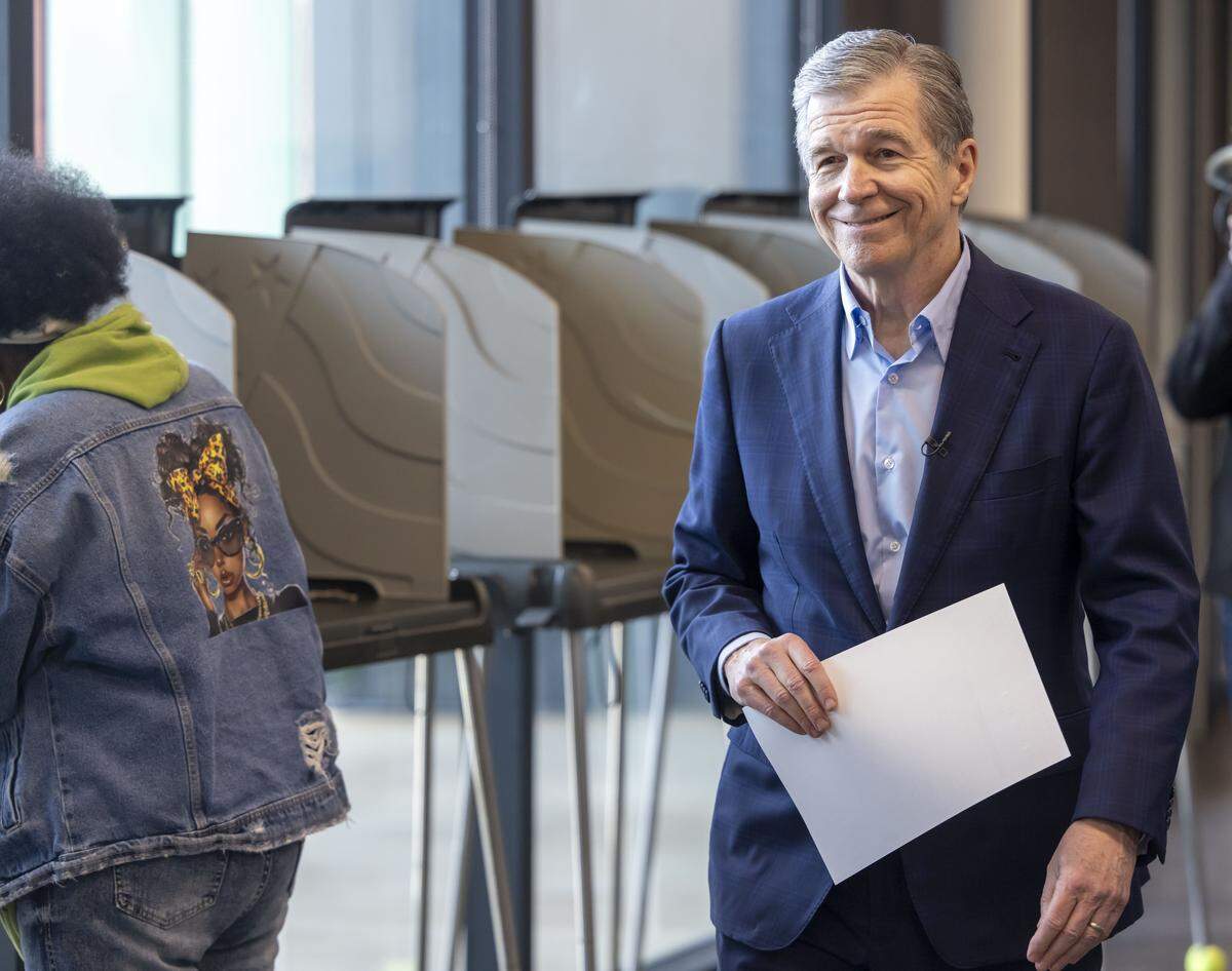 Former NC Governor and US Senate candidate Roy Cooper, casts his ballot at the Chavis Community Center, on the first day of early voting in the North Carolina primary, on Thursday, February 12, 2026 in Raleigh, N.C. 