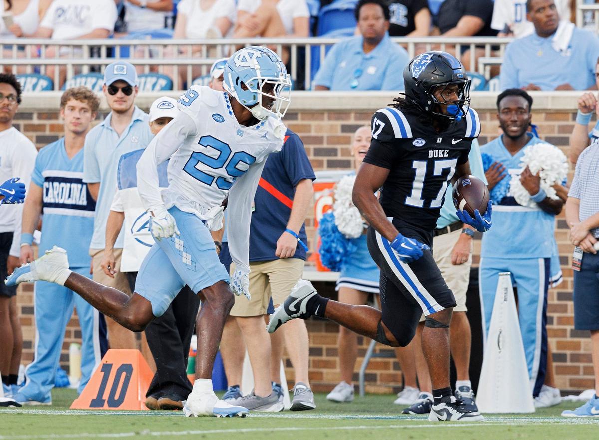 Duke’s Star Thomas runs the ball past North Carolina’s Marcus Allen during the second half of the Blue Devils’ 21-20 win on Saturday, Sept. 28, 2024, at Wallace Wade Stadium in Durham, N.C.