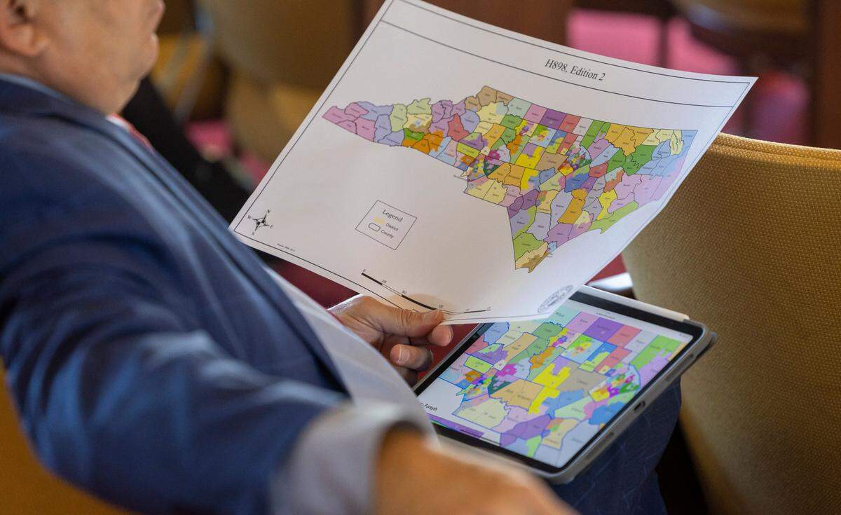 Copies of a redistricting map were handed out in the House Rules Committee meeting on Oct. 24, 2023, at the General Assembly in Raleigh.