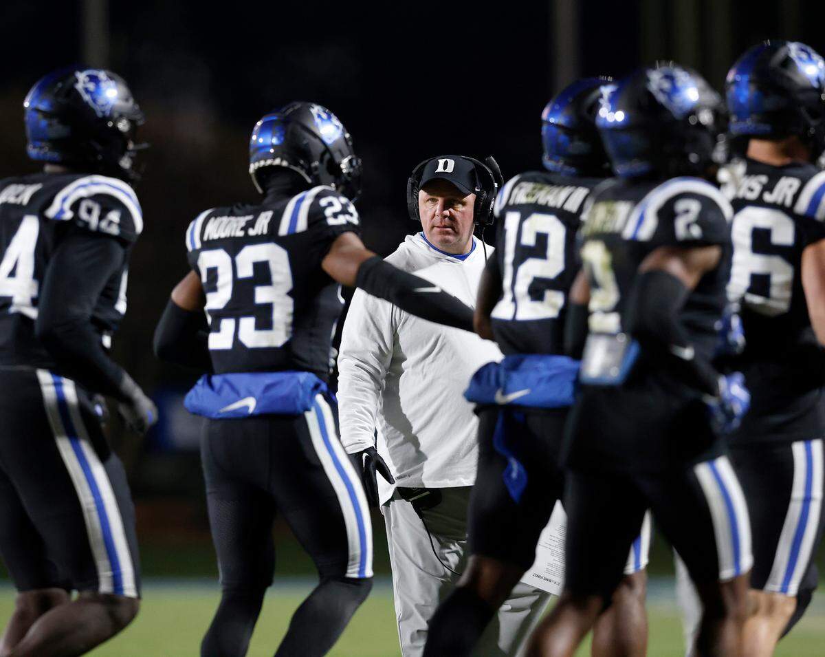 Duke head coach Mike Elko watches from the sidelines during the second half of the Blue Devils’ 24-21 win over Wake Forest on Thursday, Nov. 2, 2023, at Wallace Wade Stadium in Durham, N.C.