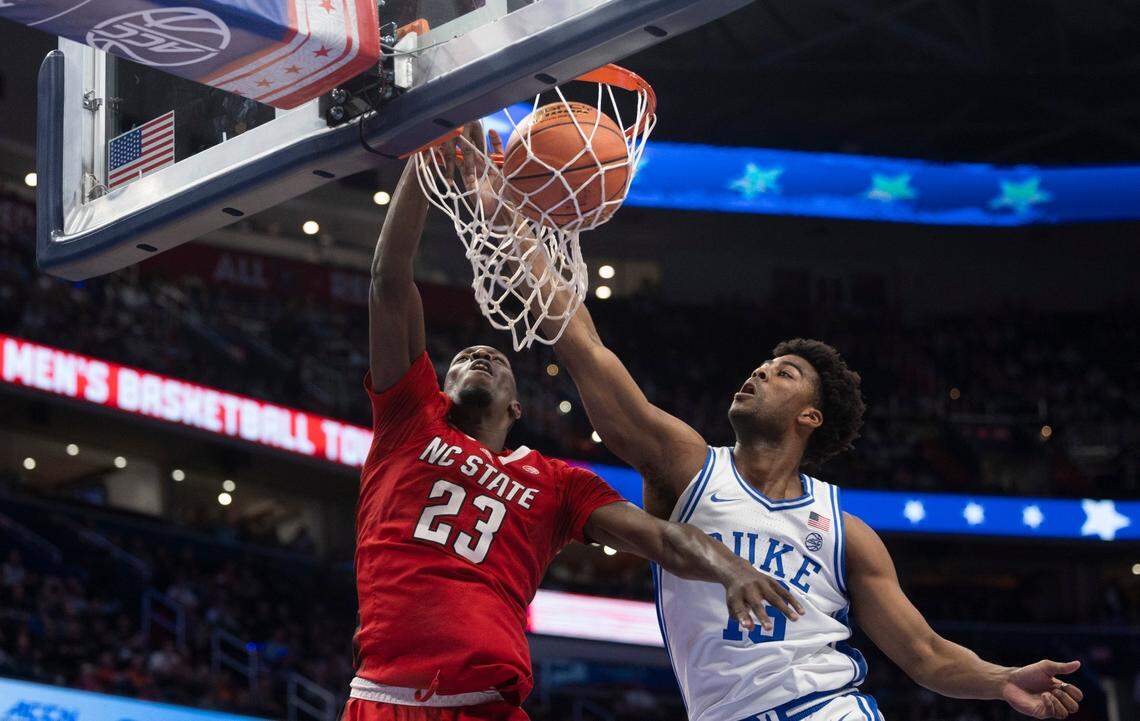 N.C. State’s Mohamed Diarra (23) dunks on Duke’s Sean Stewart (13) in the first half during the quarterfinals of the ACC Men’s Basketball Tournament at Capitol One Arena on Wednesday, March 13, 2024 in Washington, D.C.