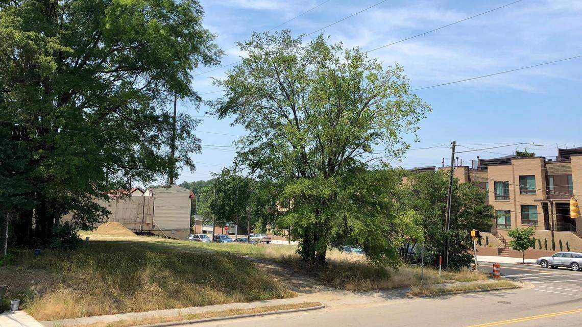 A developer wants to build eight town homes on a former city-owned property near the Red Hat Amphitheater.