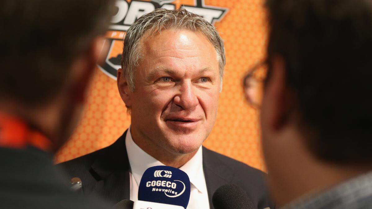 Former NHL player Claude Lemieux speaks to the media on Day 2 of the 2014 NHL Draft at the Wells Fargo Center in Philadelphia, Pennsylvania, on June 28, 2014.