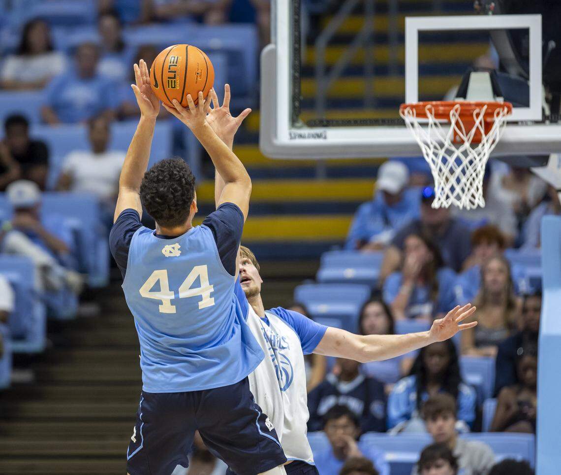 North Carolina guard Luka Bogavac (44) launches a three-point shot over North Carolina center Henri Veesaar (13) during the Blue-White scrimmage on Saturday, October 4, 2025 at the Smith Center in Chapel Hill, N.C.