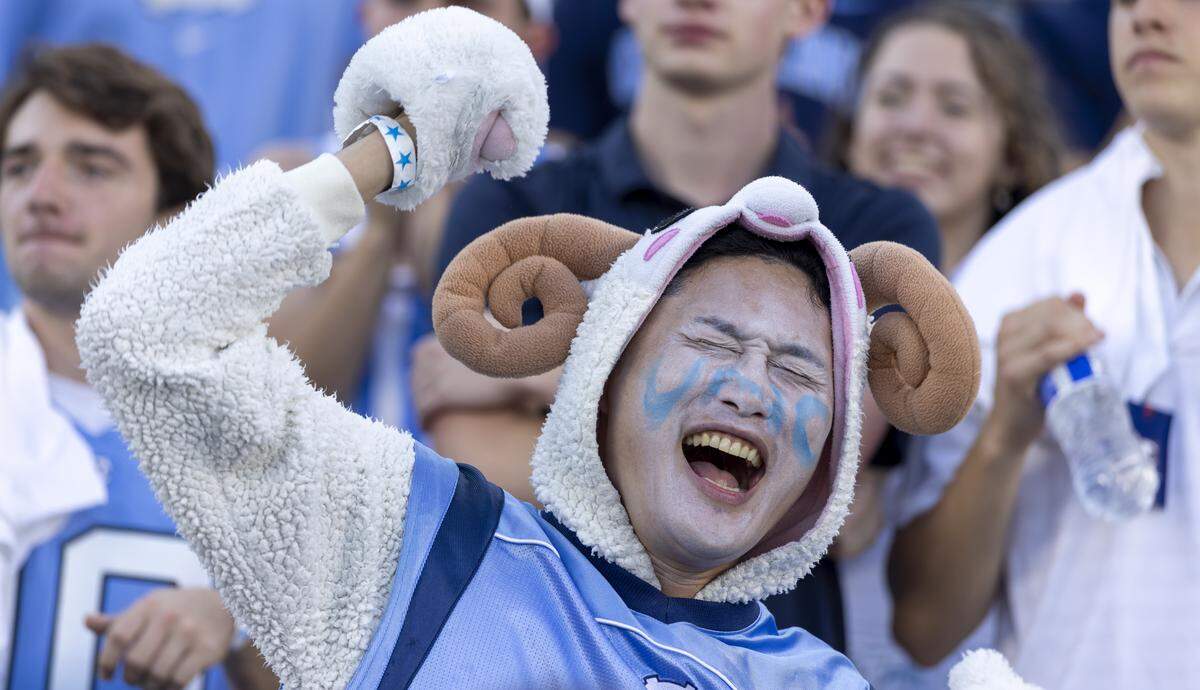North Carolina graduate student Darby Kim celebrates in the student section following the Tar Heels’ 41-6 victory over Richmond on Saturday, September 13, 2025 at Kenan Stadium in Chapel Hill, N.C.