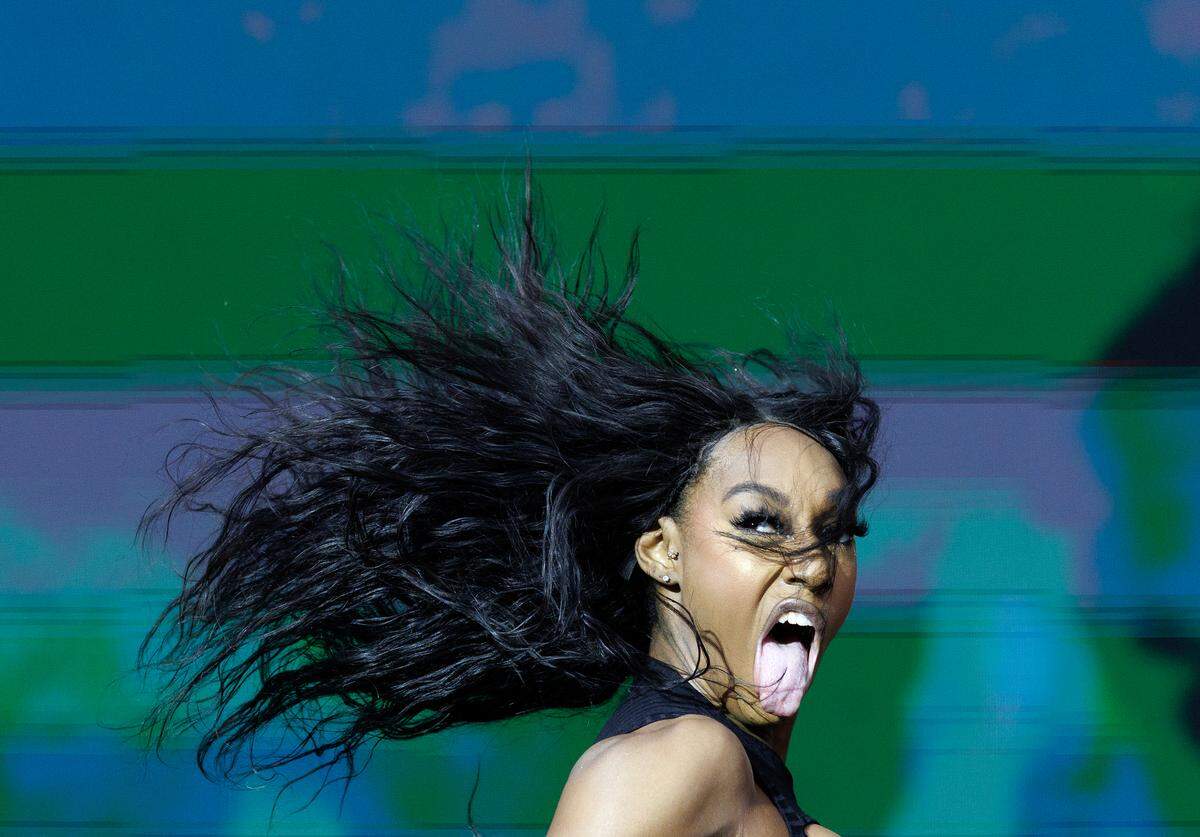 A dancer performs with GloRilla during the fifth Dreamville Festival on Sunday, April 6, 2025, at Dorothea Dix Park in Raleigh, N.C.