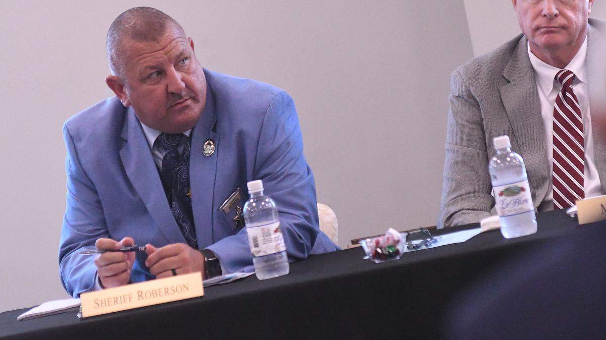 Chatham County Sheriff Mike Roberson listens as Assistant Attorney General Bob Pickett presents cases during the North Carolina Sheriffs’ Education and Training Standards Full Commission meeting Thursday June 16, 2022 at the Brunswick County Courthouse in Bolivia, NC.