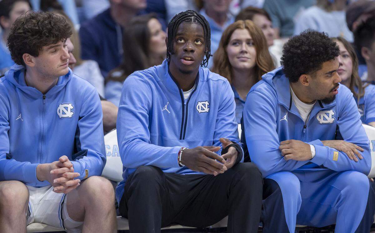 North Carolina forward Caleb Wilson, out recovering from a fractured left hand, watches the second half of the Tar Heels’ game against Virginia Tech on Saturday, February 28, 2026 at the Smith Center in Chapel Hill, N.C