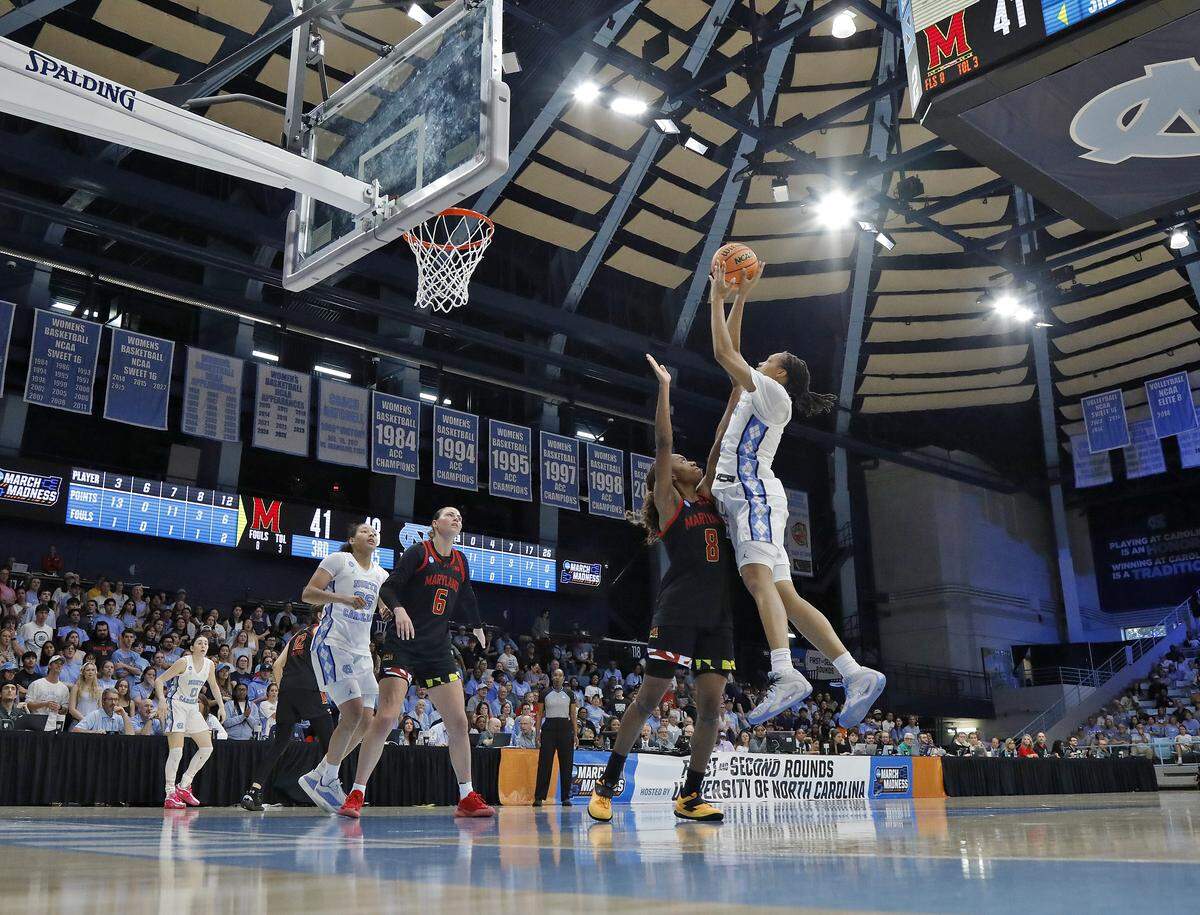 North Carolina’s Nyla Brooks shoots over Maryland’s Kyndal Walker during the second half of the Tar Heels’ 74-66 second-round NCAA Tournament win on Sunday, March 22, 2026, at Carmichael Arena in Chapel Hill, N.C.