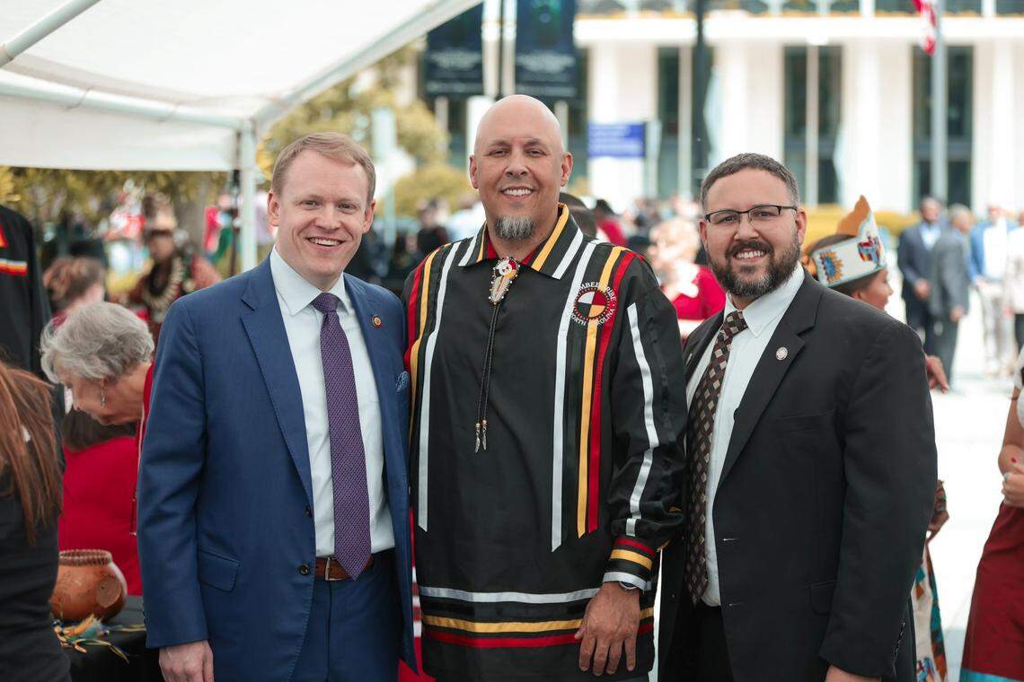 Rep. Destin Hall, who was chairman of the House Rules Committee at the time, with Lumbee Tribal Chairman John Lowery and his younger brother, Rep. Jarrod Lowery, during Lumbee Day at the N.C. General Assembly on Wednesday, April 26, 2023.