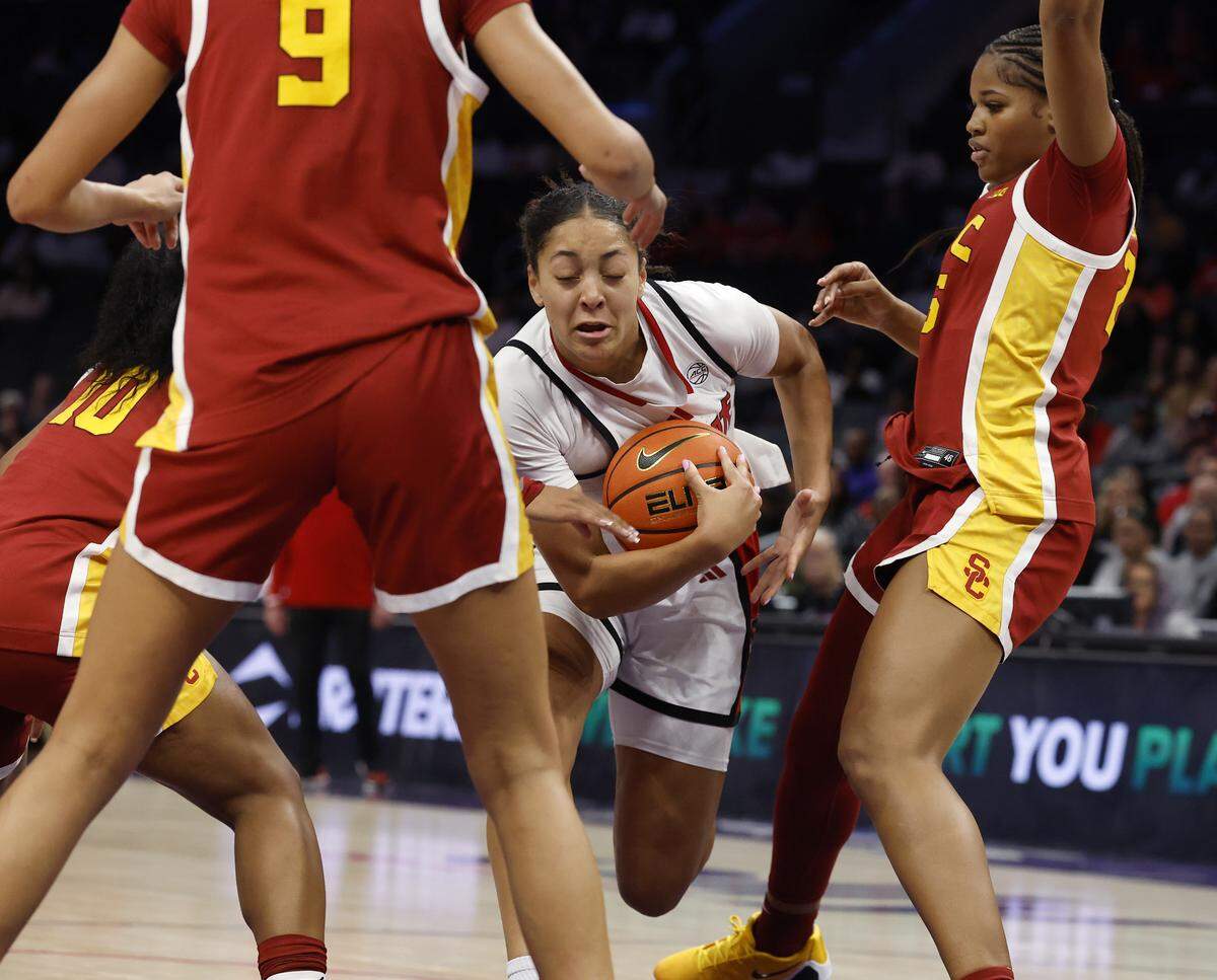 N.C. State’s Khamil Pierre drives into the defense during the first half of the Wolfpack’s 69-68 loss to Southern California in the Ally Tipoff game on Sunday, Nov. 9, 2025, at Spectrum Center in Charlotte, N.C.