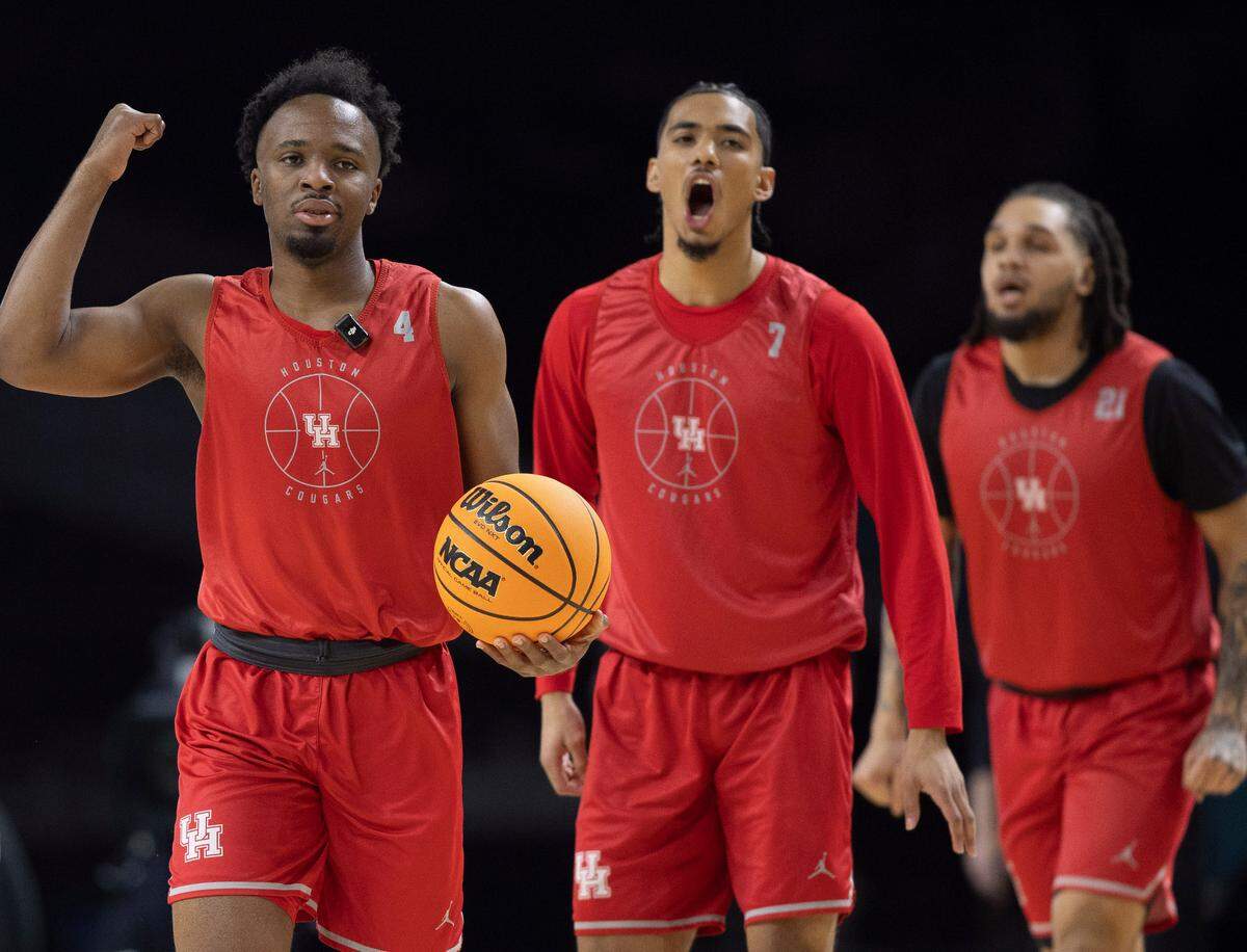 Houston guard L.J. Cryer (4) leads the Cougars to the court for their practice on Friday, April 4, 2025 during the NCAA Final Four at the Alamodome in San Antonio, TX.