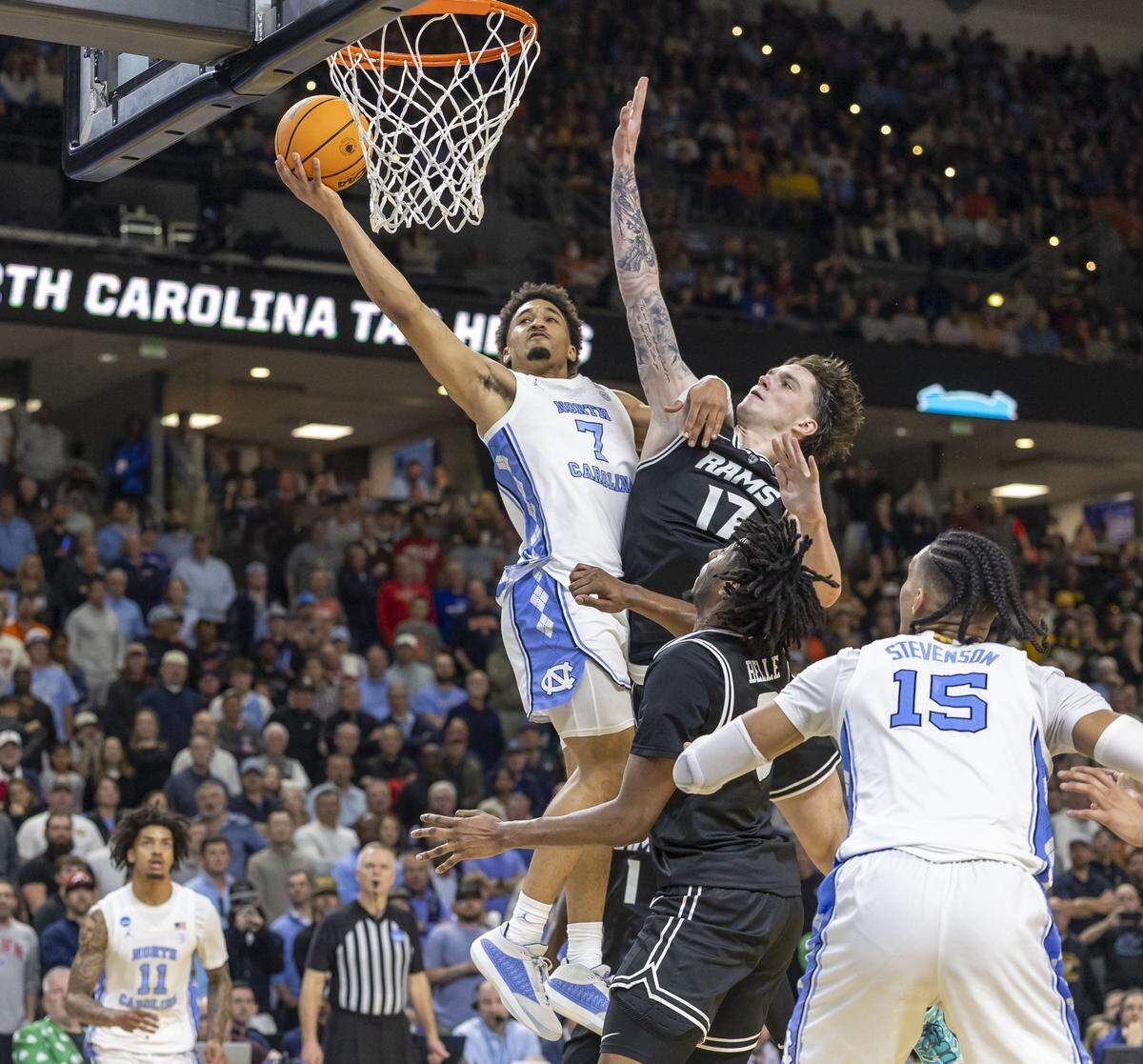 North Carolina guard Seth Trimble (7) misses a layup with the score tied 77-77 in overtime against VCU, on Thursday, March 18, 2026, during the first round of the NCAA Tournament at Bon Secours Arena in Greenville, S.C