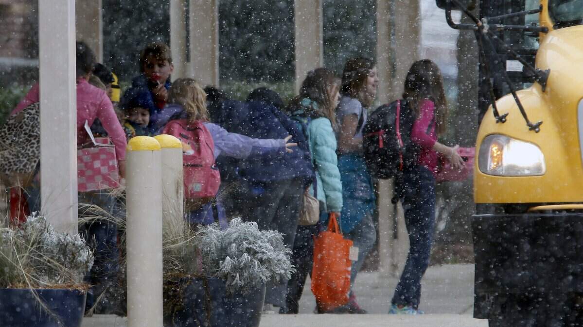 A fine powdery snow began falling around 1230 p.m. on Feb. 12, 2016 as students began boarding their buses for a previously scheduled early release day at Cary Elementary School. School admininstrators are recommending that Cary Elementary start the school day 45 minutes later at 9:15 a.m. beginning in the 2019-20 school year.