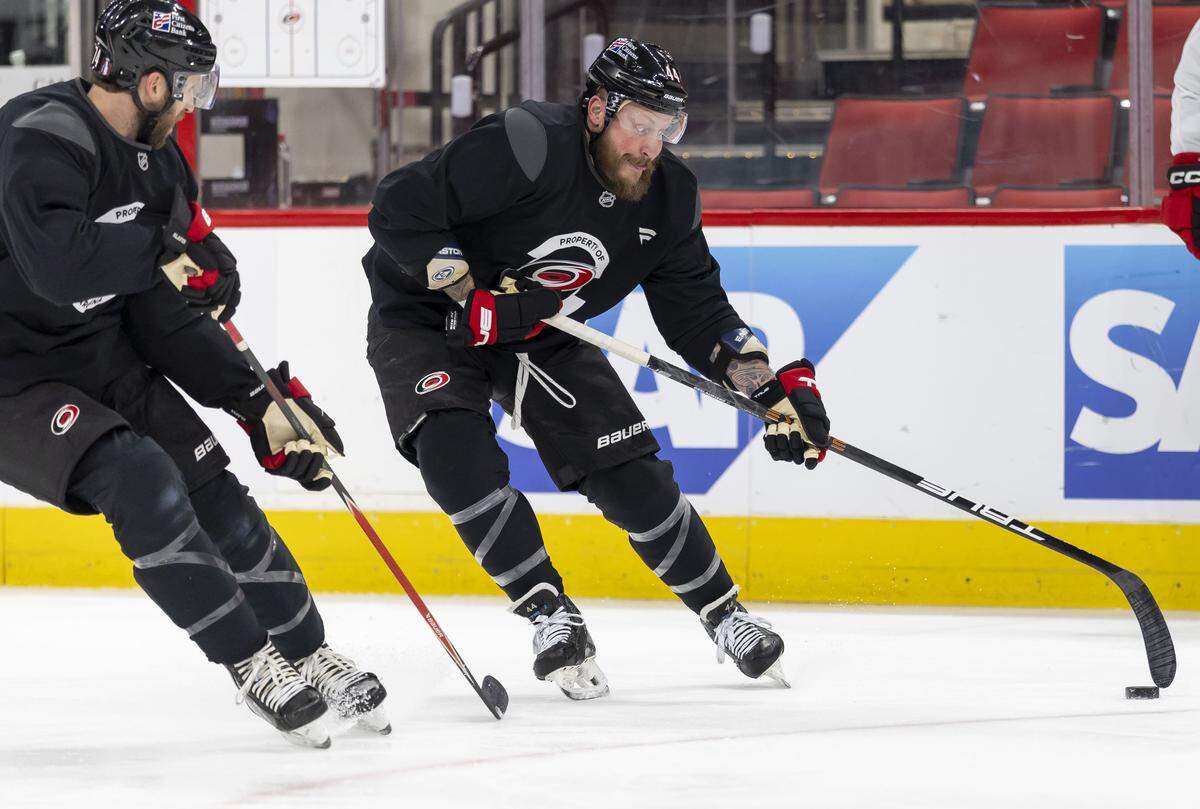 Carolina Hurricanes left wing Nicolas Deslauriers (44) works to control the puck during practice on Tuesday, May 12, 2026, at Lenovo Center in Raleigh, N.C. 