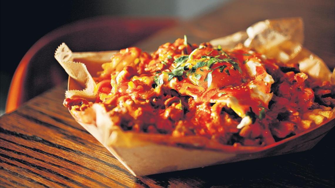 
Order the Kimchi Bul-fries with your choice of bulgogi served nacho style over waffle fries, topped with pan-fried kimchi, a fried egg and spicy aioli at Namu Restaurant & Coffee Bar.
