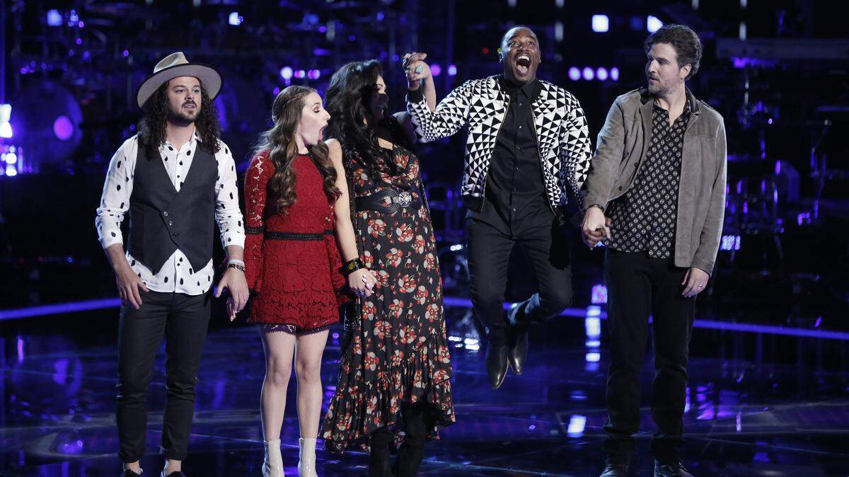 (L-R) Drew Cole, Jackie Verna, Mia Boostrom, Rayshun Lamarr and Reid Umstattd get the fan vote results during a Live Playoff round of "The Voice" on April 18.