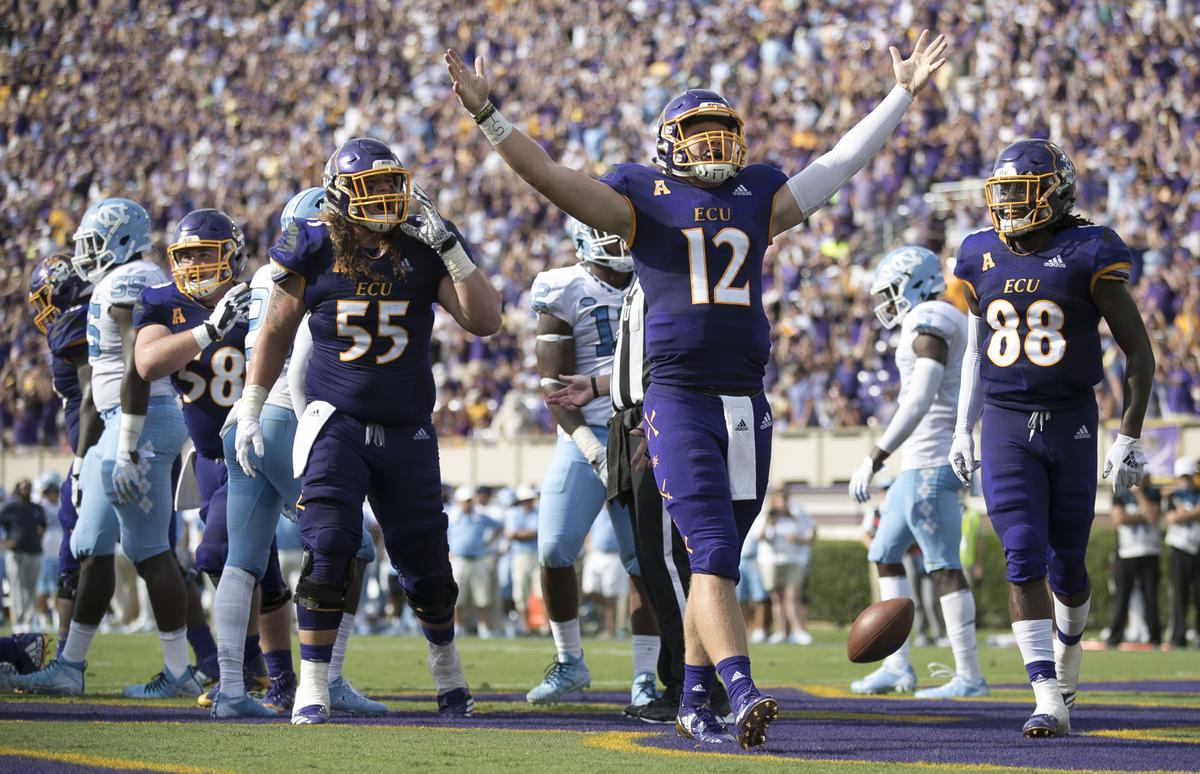 East Carolina quarterback Holton Ahlers (12) celebrates after scoring a touchdown in the second quarter against North Carolina on Saturday, September 8, 2018 at Dowdy-Ficklen Stadium in Greenville, N.C.