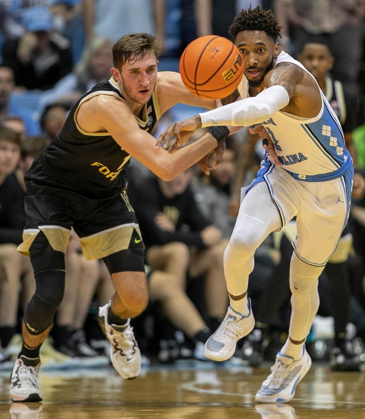 North Carolina’s Leaky Black (1) makes a steal from Wake Forest’s Andrew Carr (11) in the second half on Wednesday, January 4, 2023 at the Smith Center in Chapel Hill, N.C.