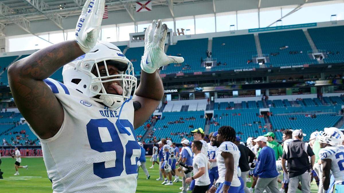 Duke defensive tackle Aeneas Peebles celebrates after Duke beat Miami 45-21, in an NCAA college football game, Saturday, Oct. 22, 2022, in Miami Gardens, Fla. (AP Photo/Wilfredo Lee)