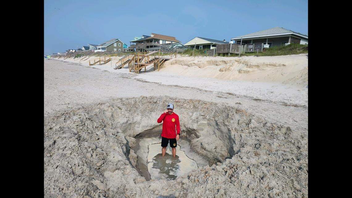 A giant hole was discovered in the beach at Surf City, North Carolina, and town officials are blaming enthusiastic tourists.