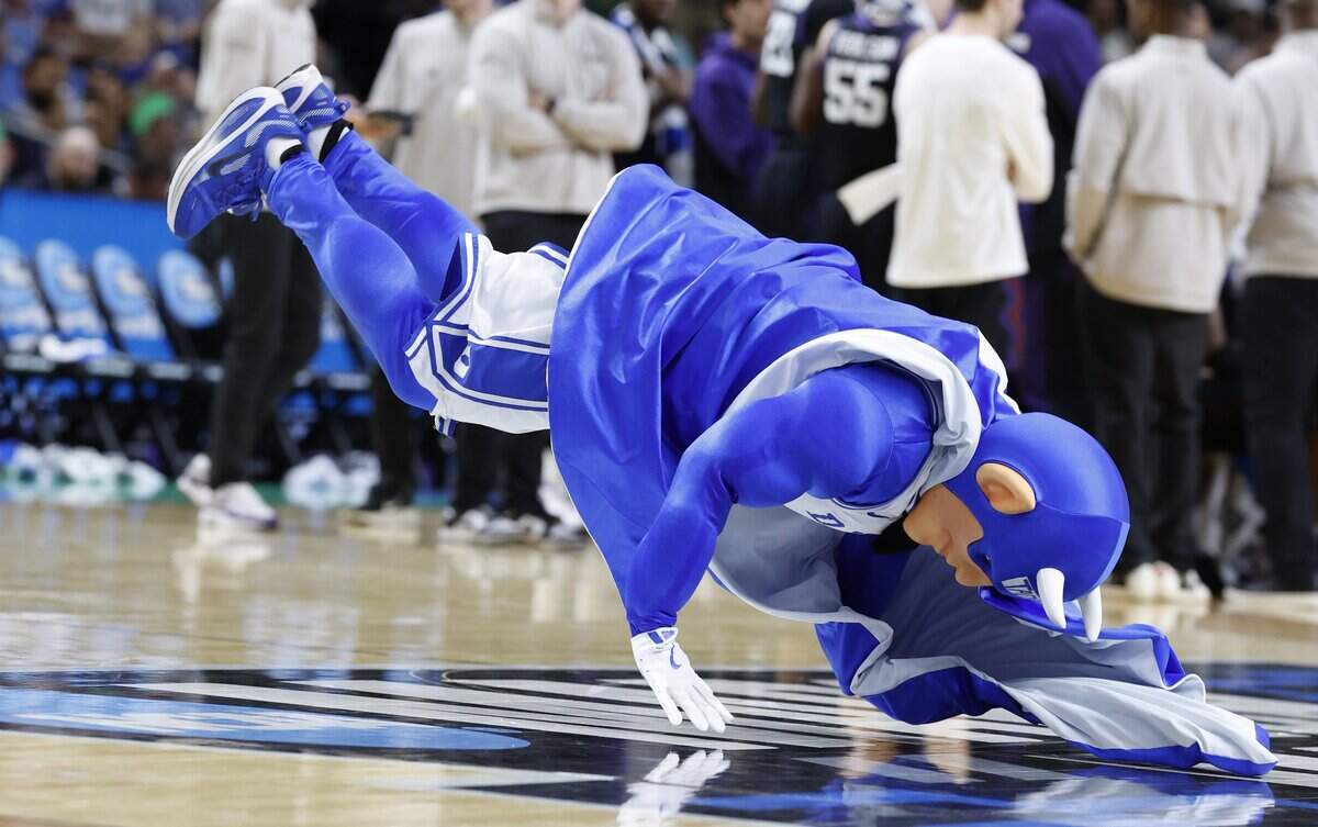 The Blue Devil dances during a timeout in the first half of DukeÕs game against TCU in the second round of the NCAA MenÕs Basketball Tournament at  Bon Secours Wellness Arena in Greenville, S.C., Saturday, March 21, 2026.
