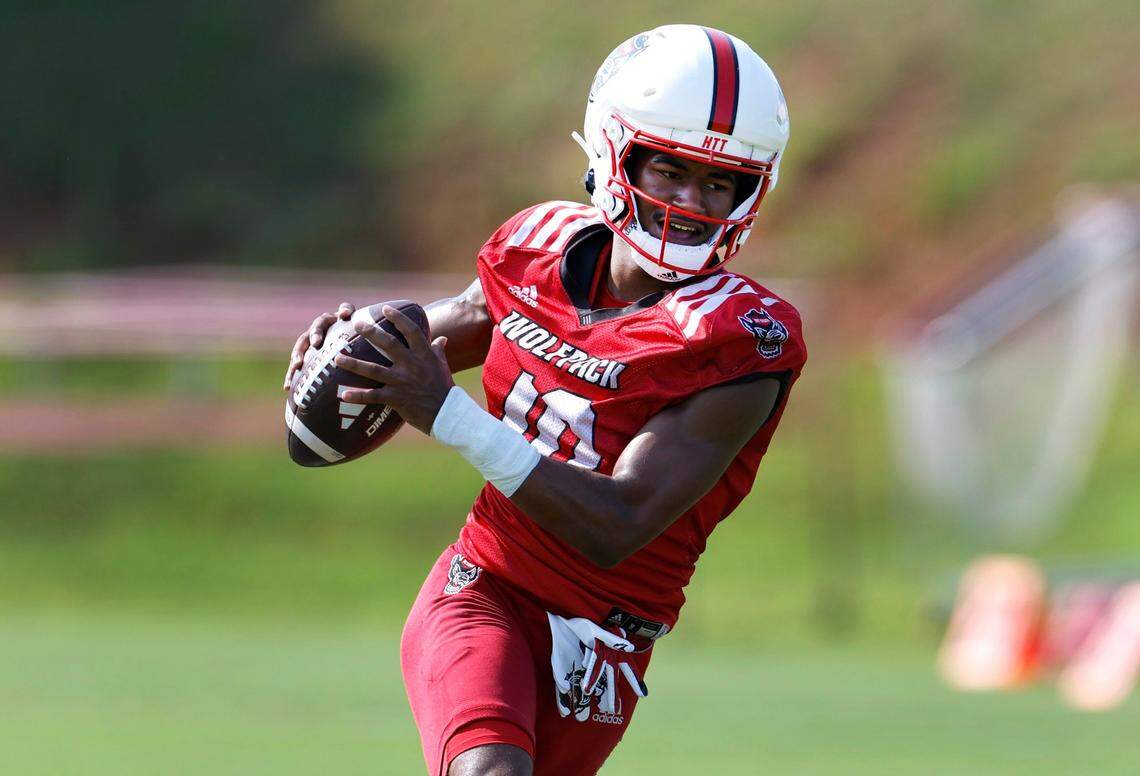 N.C. State wide receiver KC Concepcion (10) pulls in a reception during the Wolfpack’s first practice in Raleigh, N.C., Wednesday, July 31, 2024.