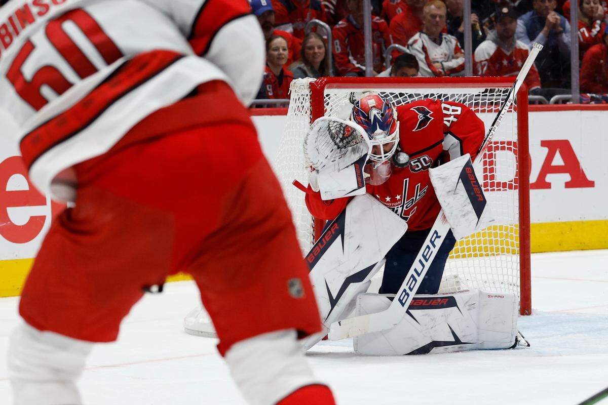 Washington Capitals goaltender Logan Thompson (48) makes a save on Carolina Hurricanes left wing Eric Robinson (50) in the second period in game two of the second round of the 2025 Stanley Cup Playoffs at Capital One Arena.