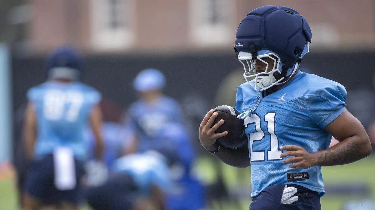 North Carolina running back Davion Gause (21) carries the ball during the Tar Heels’ football practice on Saturday, August 2, 2025 in Chapel Hill, N.C.