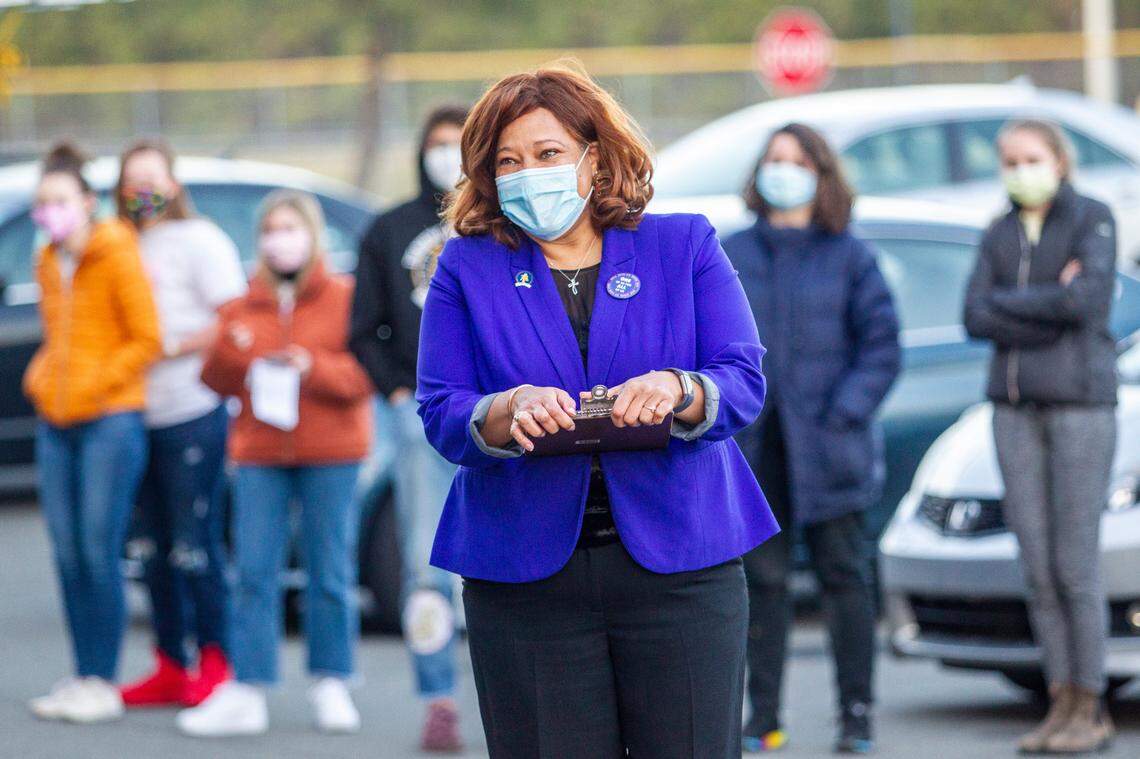 Erica Smith listens to speakers during her 2022 U.S Senate campaign launch event Saturday, March 8, 2021 at Hillside High School in Durham. Smith is running on an unabashedly progressive platform, embracing Medicare for All, universal basic income, the Green New Deal and canceling all student loan debt.