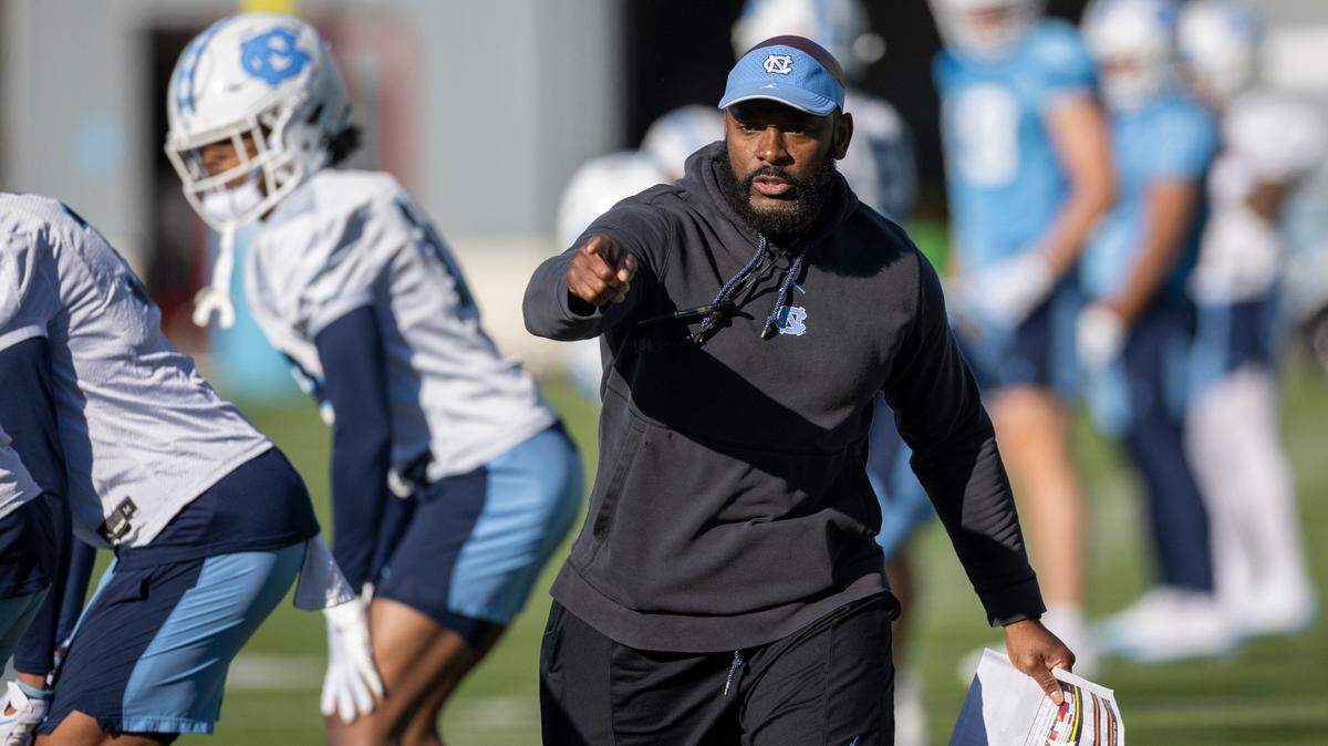 North Carolina assistant head coach for defense, Charlton Warren works with his unit during the opening day of spring football practice on Tuesday, March 19, 2024 in Chapel Hill, N.C.