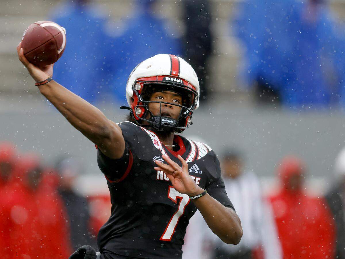 N.C. State quarterback MJ Morris throws a pass during the Wolfpack’s spring game at Carter-Finley Stadium on Saturday, April 8, 2023, in Raleigh, N.C.