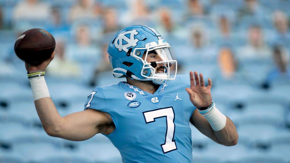 North Carolina quarterback Sam Howell (7) warms up for the Tar Heels’ game against Western Carolina on Saturday, December 5, 2020 at Kenan Stadium in Chapel Hill, N.C.