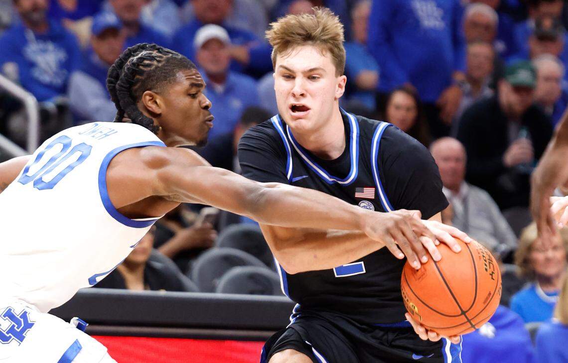 Duke’s Cooper Flagg (2) operated against Kentucky’s Otega Oweh (00) during the Wildcats’ 77-72 win over the Blue Devils in Atlanta on Nov. 12. Duke was the nation’s No. 1-ranked team entering postseason play.
