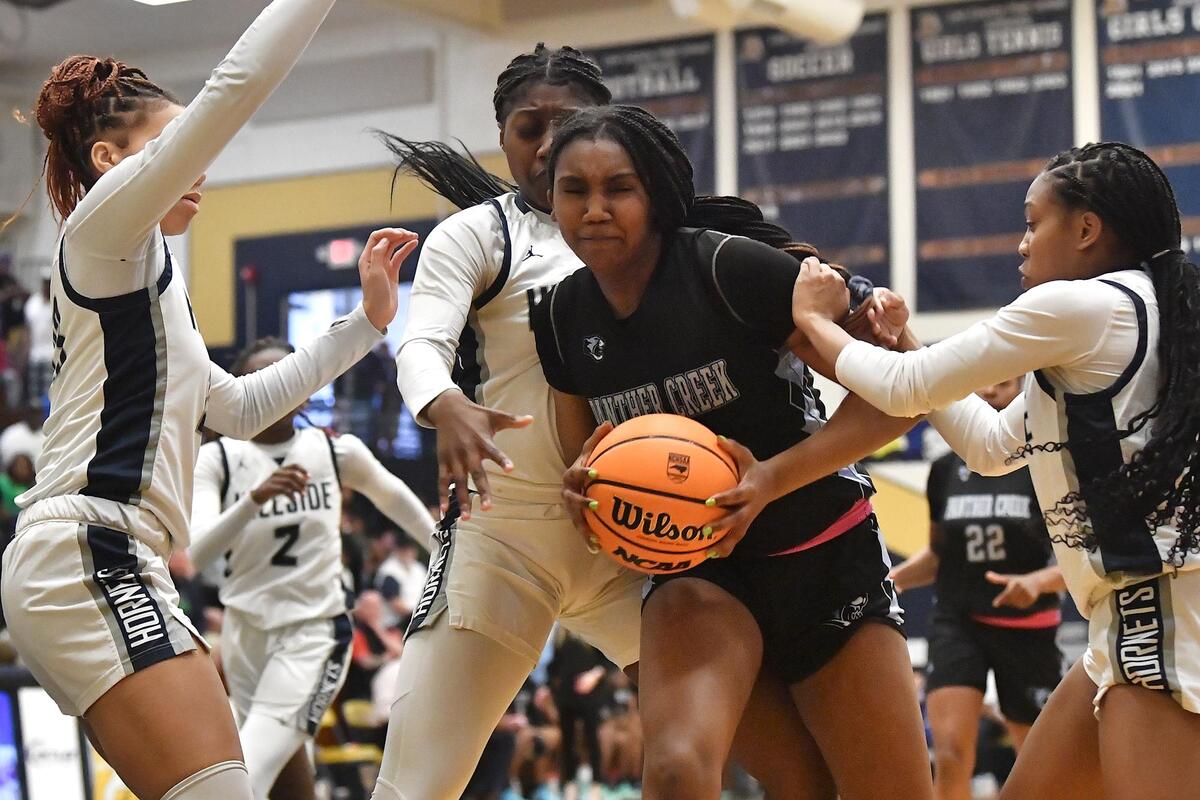 Panther Creek’s Madisyn Jordan (14) controls the ball against the Hillside defense in the first half. The Hillside Hornets and the Panther Creek Catamounts met in the NCHSAA 4A East Regional Finals in Sanford, N.C. on March 4, 2023.