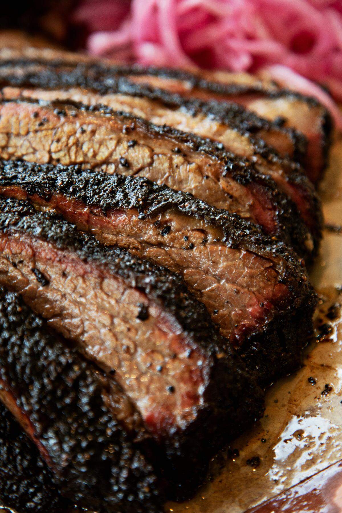 Jon G’s Barbecue serves ribs, brisket, pulled pork, turkey and house-made sausage links along with burnt ends and house-made pickles.