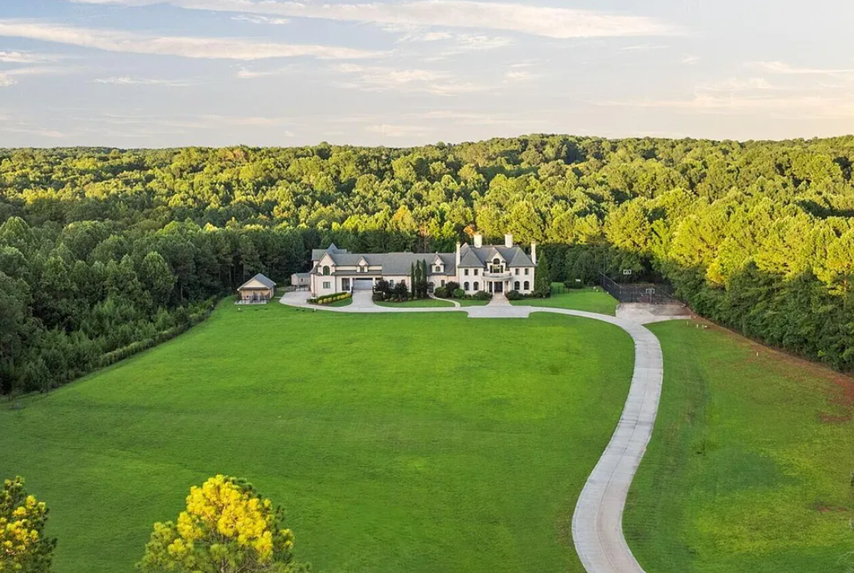 The North Raleigh mansion south of Falls Lake includes 14.2 acres.
