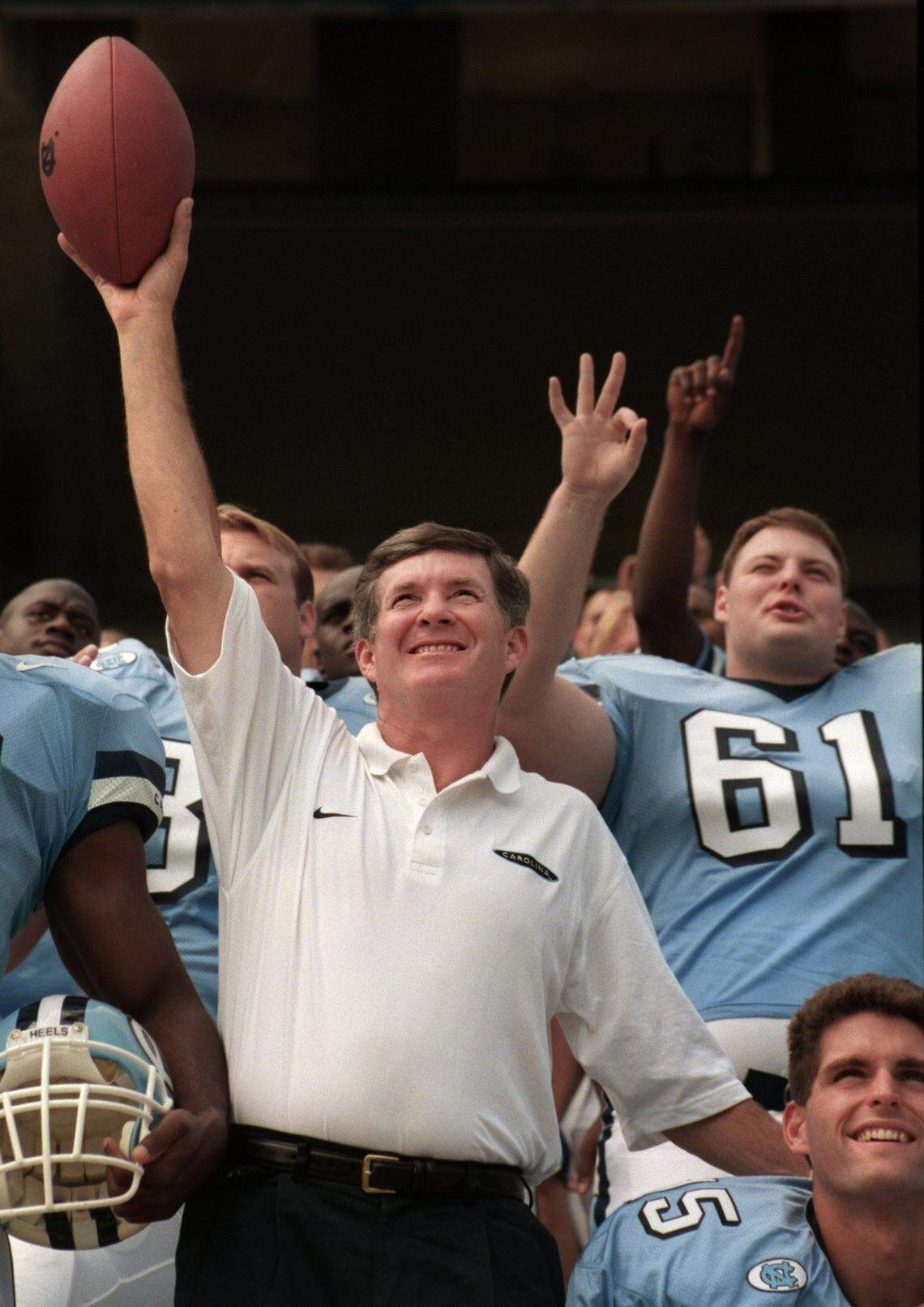 UNC coach Mack Brown and his players ham it up for a team photo at the team's picture day at Kenan Stadium in Chapel Hill in 1997.