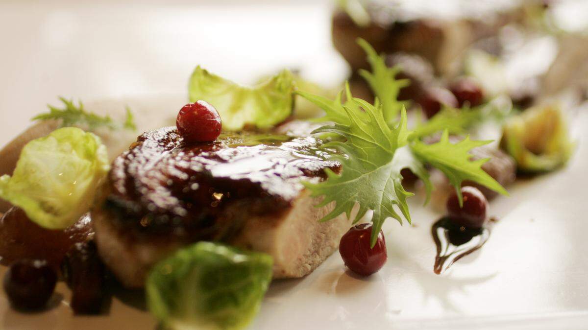 The Roasted Pheasant with chestnut puree, poached cranberries, brussels sprouts and toasted honey jus is a seasonal menu item at Herons located inside The Umstead Hotel and Spa in Cary.