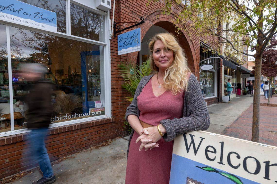 Sundi McLaughlin, owner of Mockingbird on Board, photographed on Wednesday, November 22, 2023, in Southern Pines, N.C. McLaughlin’s shop was closed for four days in December 2022, during the traditionally busy Christmas shopping season, after two Duke Energy substations in Moore County were damaged by gun fire.