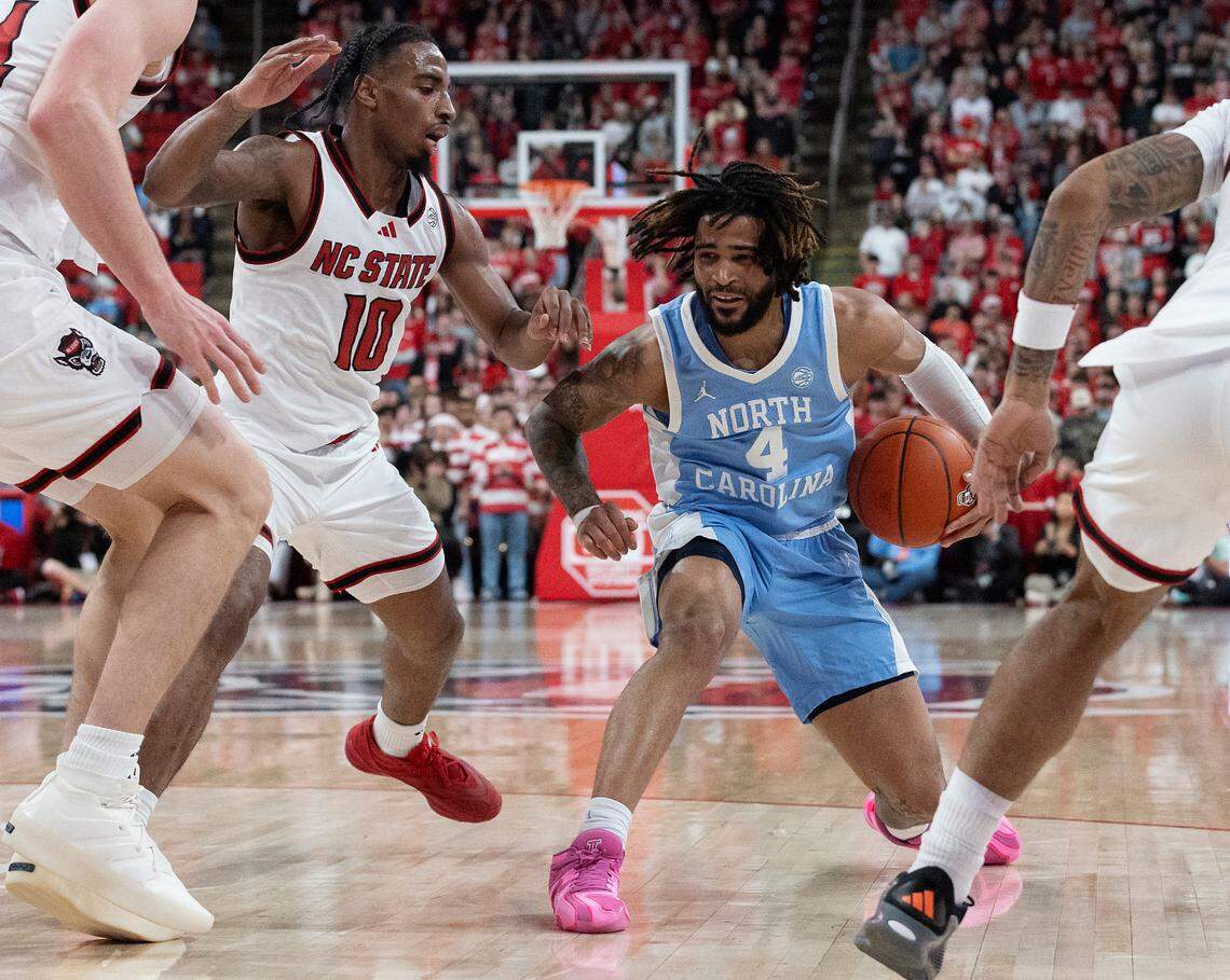 North Carolina’s RJ Davis handles the ball during the first half of the Tar Heels’ game against N.C. State at Lenovo Center on Saturday, Jan. 11, 2025, in Raleigh, N.C.