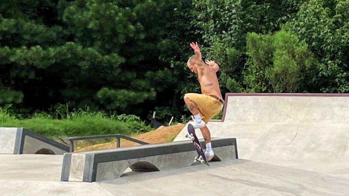 A rider leaps into the air on his skateboard on Monday, Aug. 12, 2024, at Hillsborough’s Skate Spot, in Cates Creek Park off Old N.C. 86 in Hillsborough, N.C.