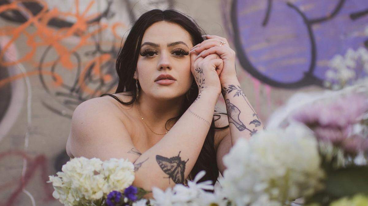 Dax Trail, a tattoo artist based in Raleigh, specializes in “cottagecore” art and botanicals.